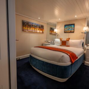 Guest stateroom of JUBILEE, a 151 foot Pendennis yacht for charter in the Mediterranean.