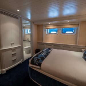 Guest stateroom of JUBILEE, a 151 foot Pendennis yacht for charter in the Mediterranean.