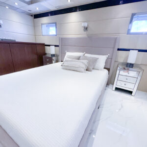 Guest stateroom of PRIVILEGE, a 112 foot Custom Line yacht for charter in the Caribbean.