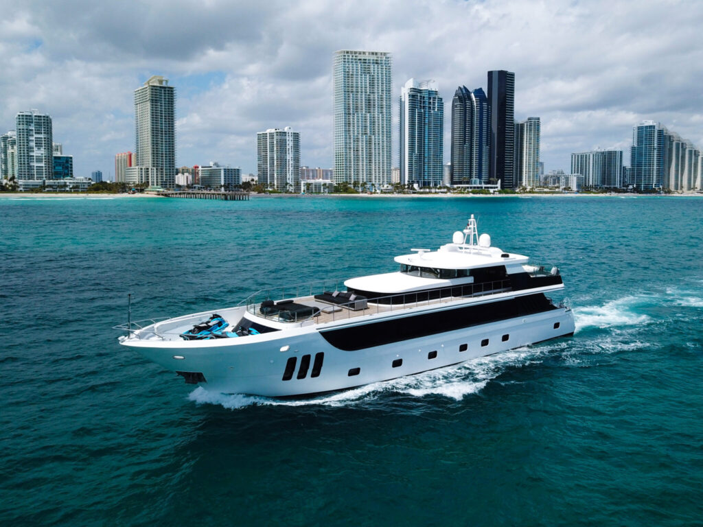 Running profile of PRIVILEGE, a 112 foot Custom Line yacht for charter in the Caribbean.