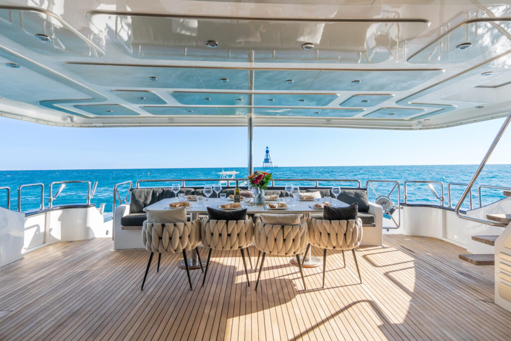 Aft deck of PRIVILEGE, a 112 foot Custom Line yacht for charter in the Caribbean.