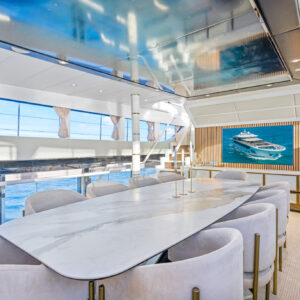 Main dining of PRIVILEGE, a 112 foot Custom Line yacht for charter in the Caribbean.