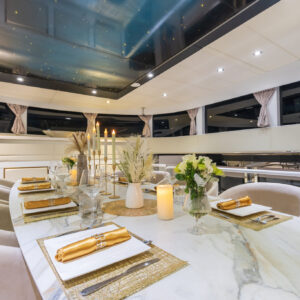 Main dining of PRIVILEGE, a 112 foot Custom Line yacht for charter in the Caribbean.