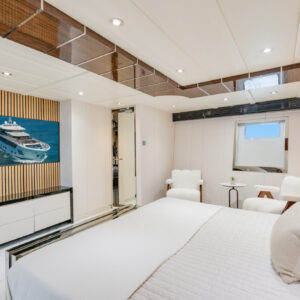 Guest stateroom of PRIVILEGE, a 112 foot Custom Line yacht for charter in the Caribbean.