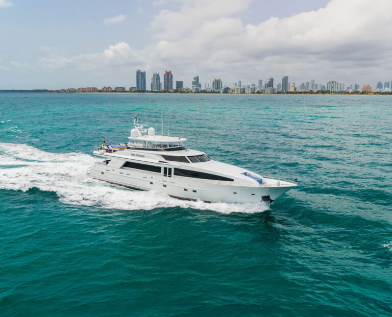 Running profile of RISK & REWARD, a 120 foot Crescent yacht for charter in the Bahamas.