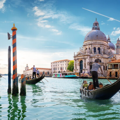 Ride on gondolas along the Grand Canal in Venice, Italy.
