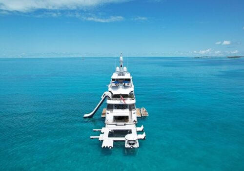 Starboard-aft profile of TOP FIVE II 200 foot Royal Hakvoort yacht for charter in the Bahamas