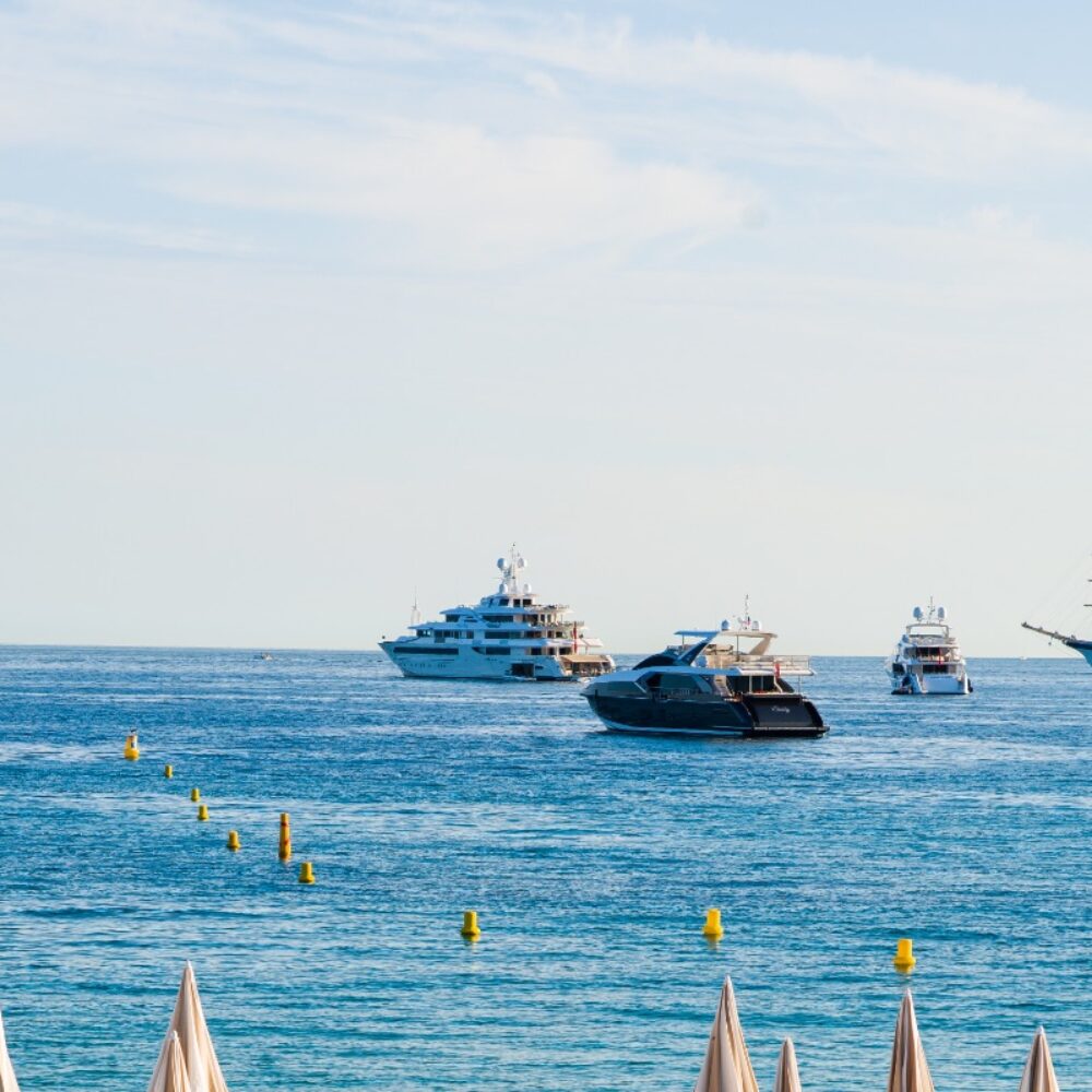 Cannes beach and luxury yacht -1200x800