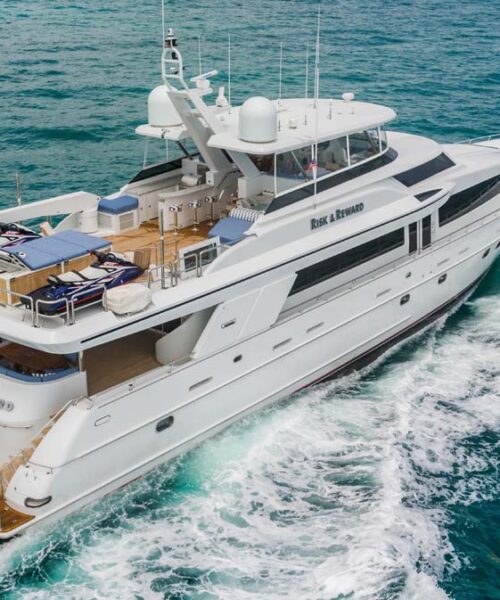 Running aft profile of RISK & REWARD, a 120 foot Crescent yacht for charter.