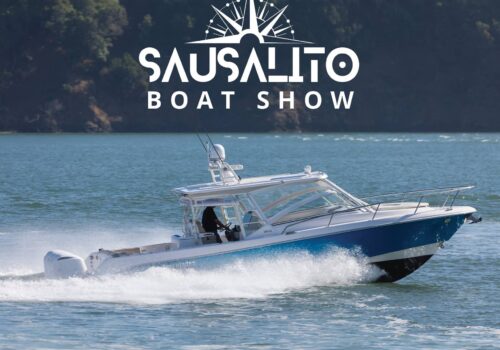 Logo of the 2024 Sausalito Boat Show with a running yacht in the background.