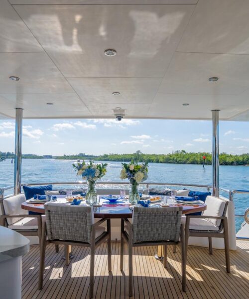 Aft deck of PILOT LOUNGE, a 91-foot Horizon yacht for charter in Florida and The Bahamas.
